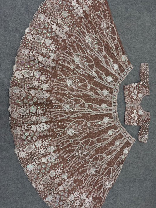 Party-wear Net Embellished With Sequence Work Lehenga Choli